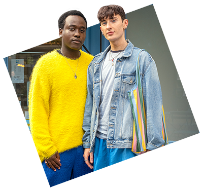 two friends standing next to each other